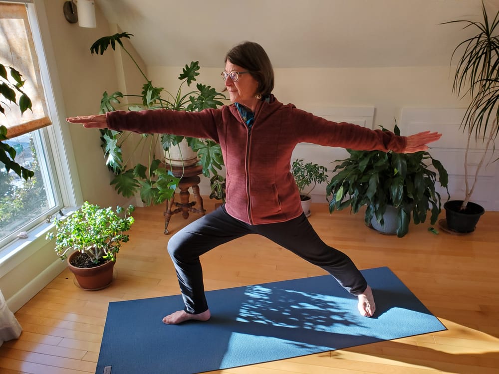 Medford teacher Judy Scribner-Moore instructs older students in yoga tailored to their needs post image